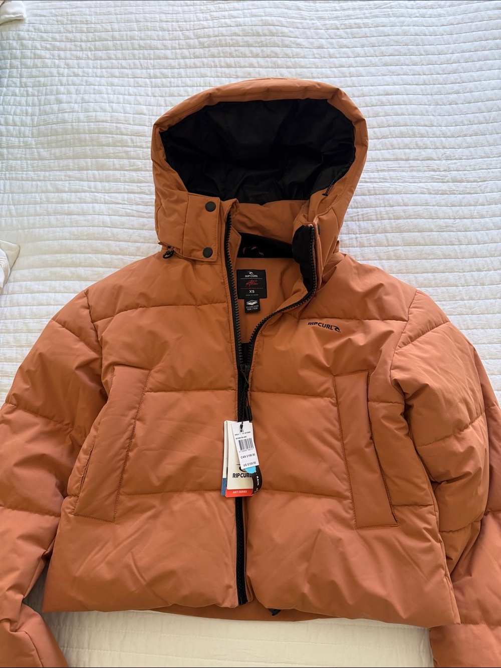 Rip Curl Women’s Hooded Puffer Jacket in Rust Orange/ Light Brown (see pics )